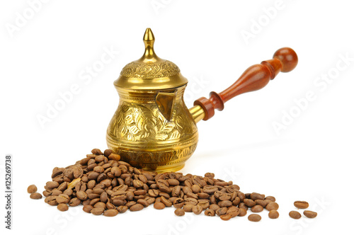coffeepot and coffee beans isolated on white background