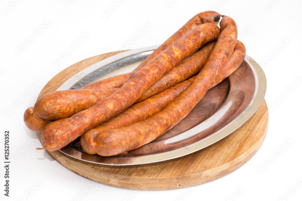 Homemade domestic sausages on the plate Homemade domestic sausages on the plate
