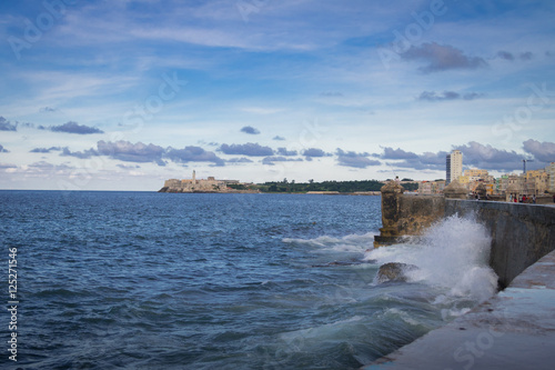 Waves crashing against the wall of El Malecon - Havana, Cuba
