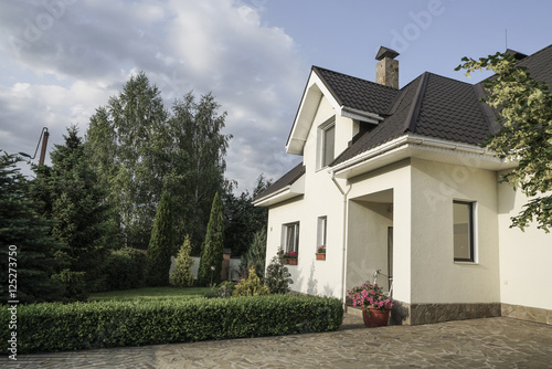 New house with a garden in a rural area