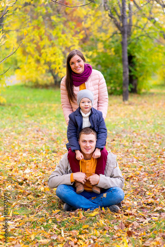 family pretend pyramid autumn park