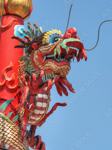 Chinese Dragon statue on the blue sky