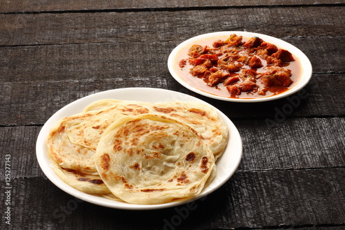 Indian cuisine-mutton curry  with paratha