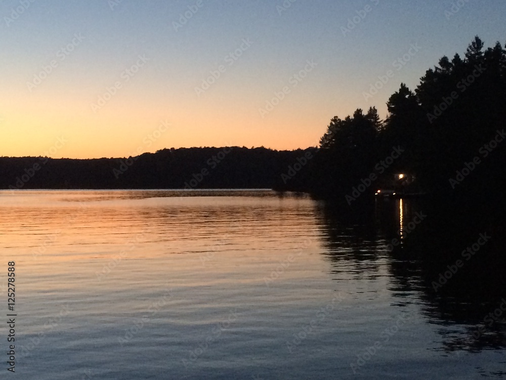 Obraz premium Soleil couché eau