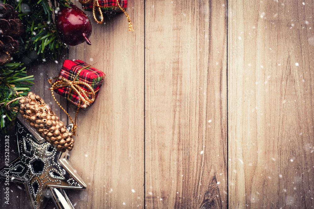 Fototapeta premium Christmas tree with decoration on wooden background