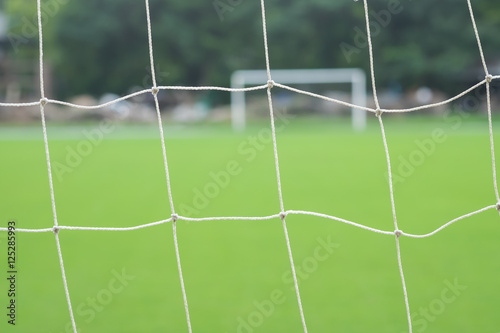 The view behind football or soccer net, background concept