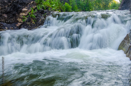 falling water in the morning mist.