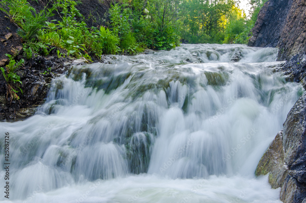 Fototapeta premium falling water in the morning mist.