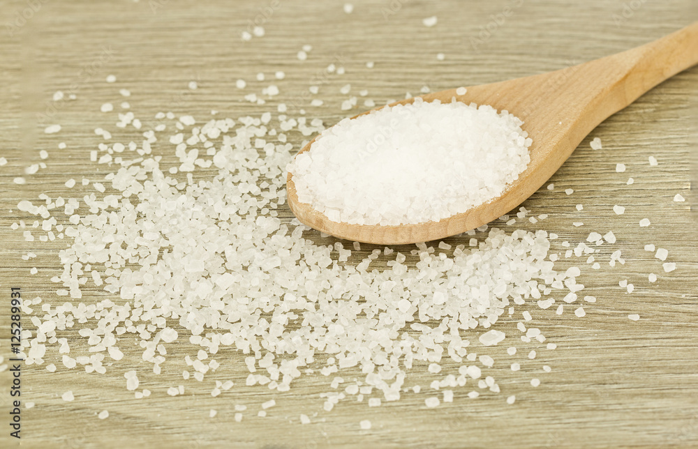 Wooden spoon of coarse salt Wooden spoon of coarse salt