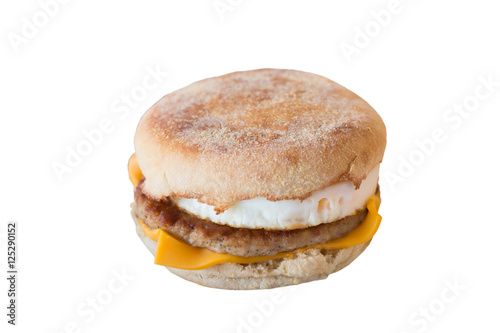 Fried sunnyside up egg on pork with a bagel and cheese