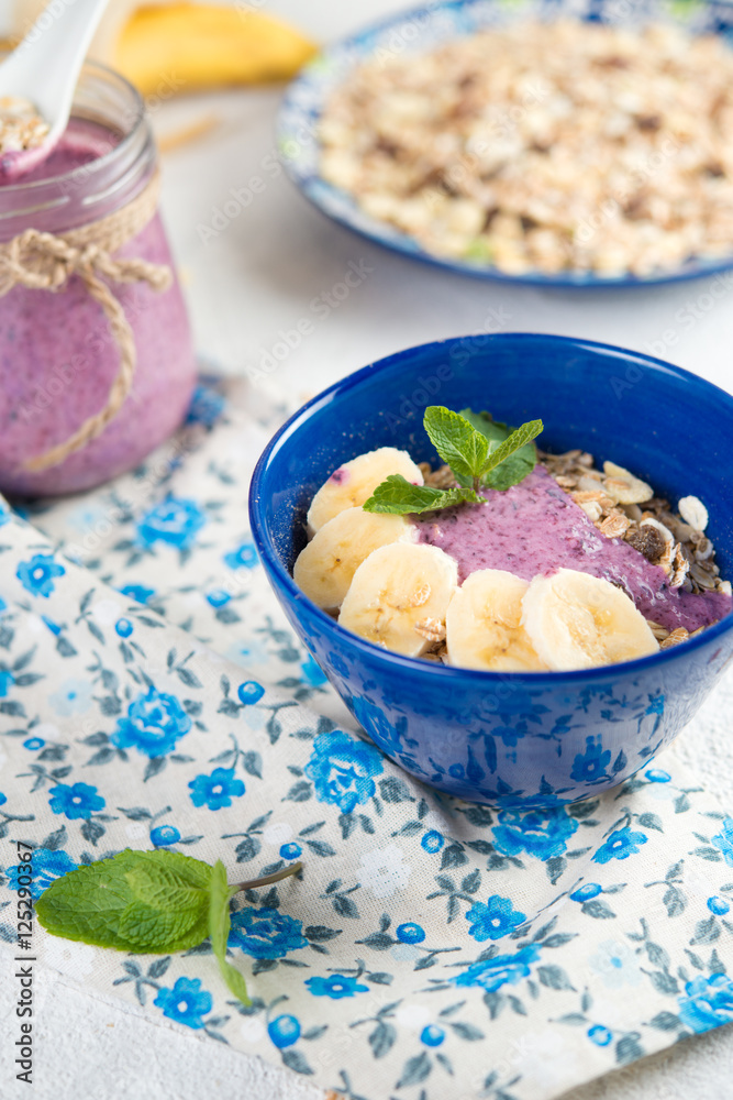 Healthy breakfast. Organic muesli with natural yogurt and bilberry
Healthy breakfast. Organic muesli with natural yogurt and bilberry