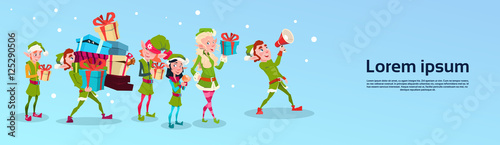 Christmas Elf Group Cartoon Character Santa Helper With Present Box Stack Flat Vector Illustration photo
