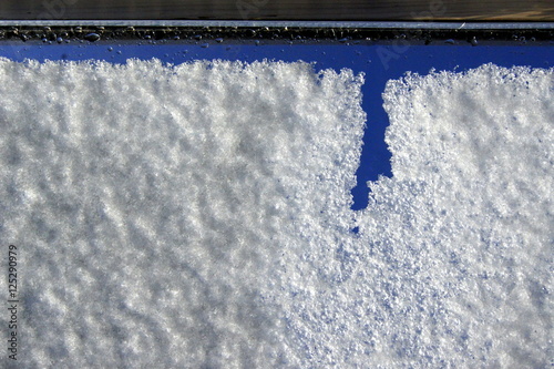 Melting snow on the window