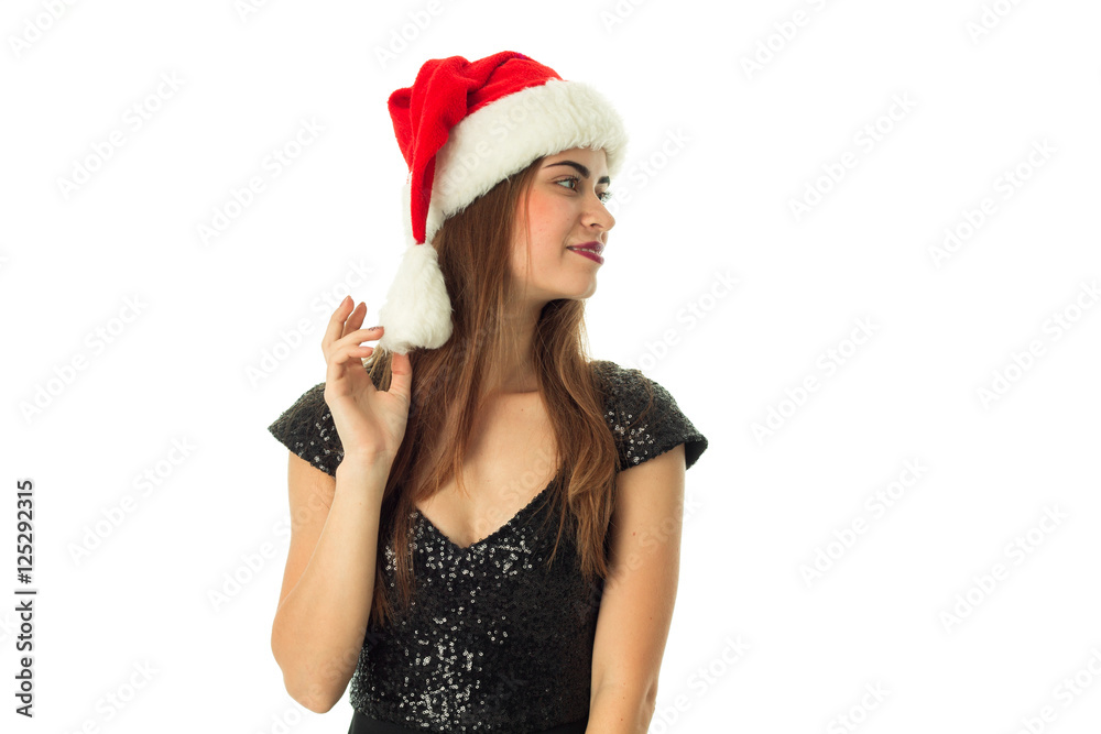 cheerful adorable girl in santa hat cheerful adorable girl in santa hat
