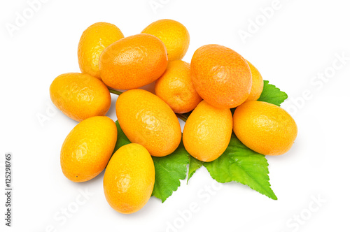 Kumquat with leaf on a white background