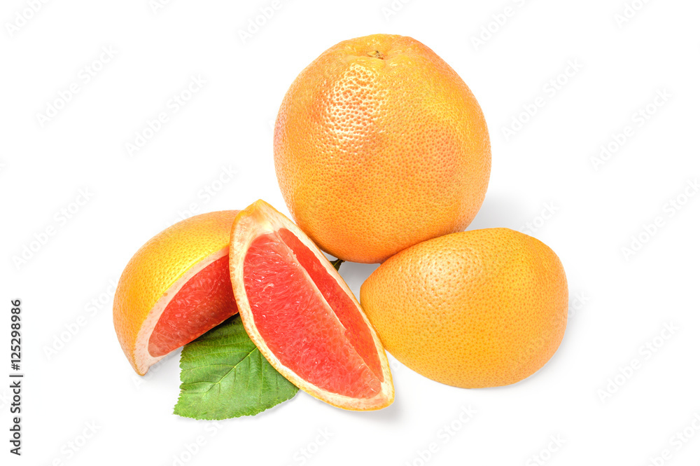 Grapefruit with wedges on white background Grapefruit with wedges on white background