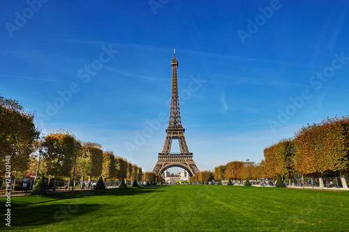 Scenic view of the Eiffel tower over blue sky