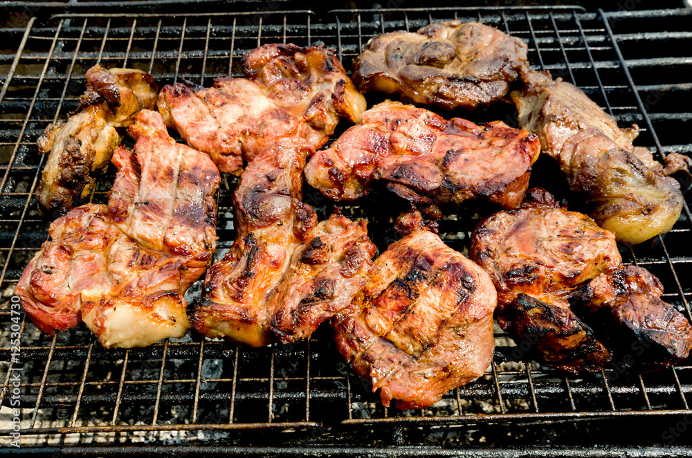 Pork roast on charcoal grill