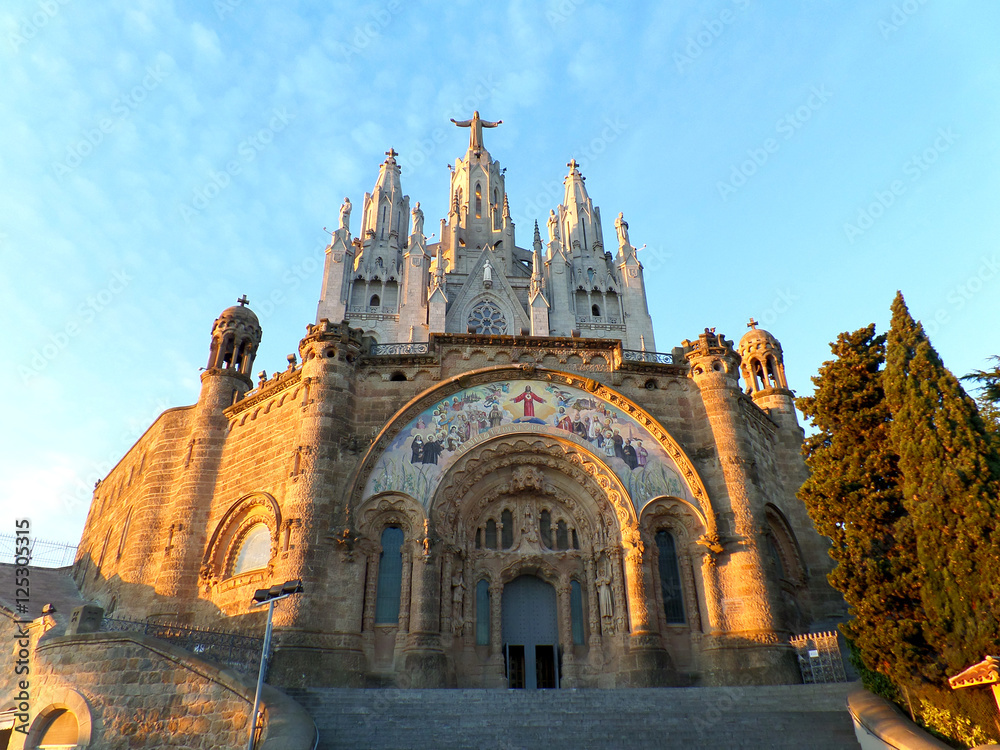 Church of the Sacred Heart in the evening sunlight, Tibidabo mountain top in Barcelona, Spain