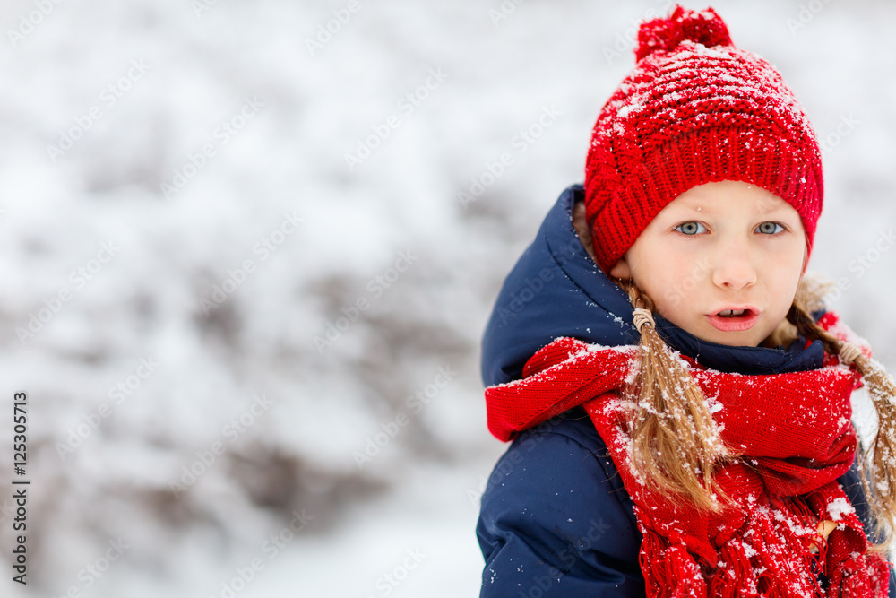 Little girl outdoors on winter Little girl outdoors on winter