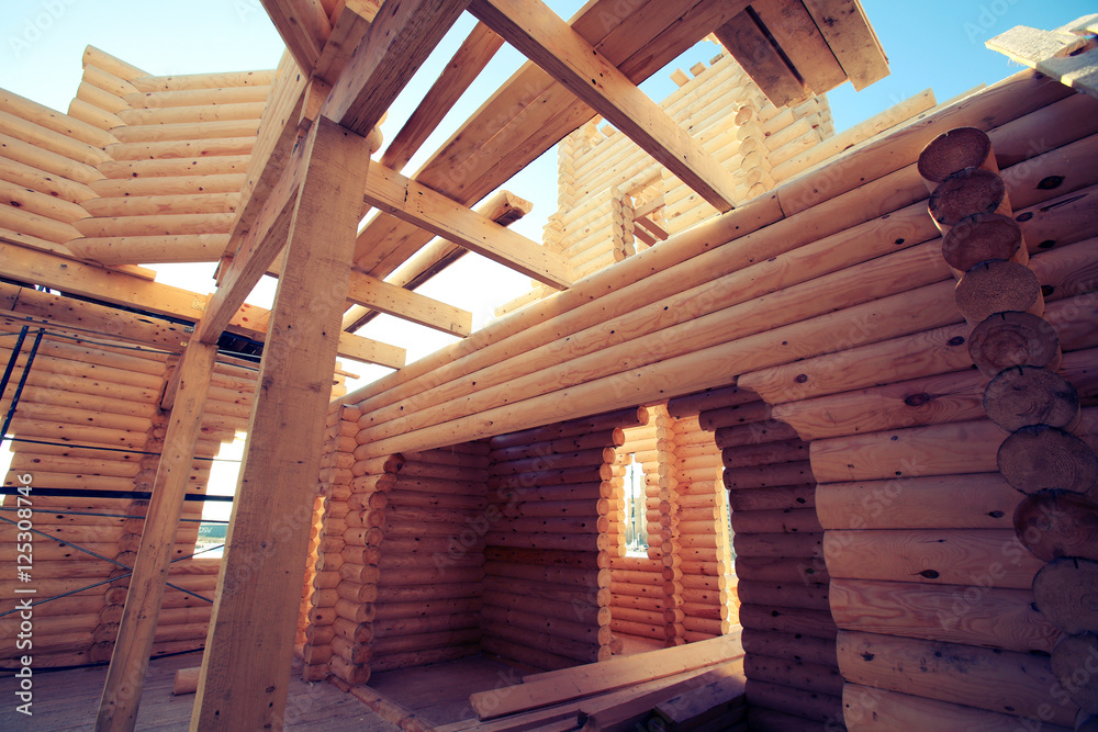 Fototapeta premium Construction of wooden house