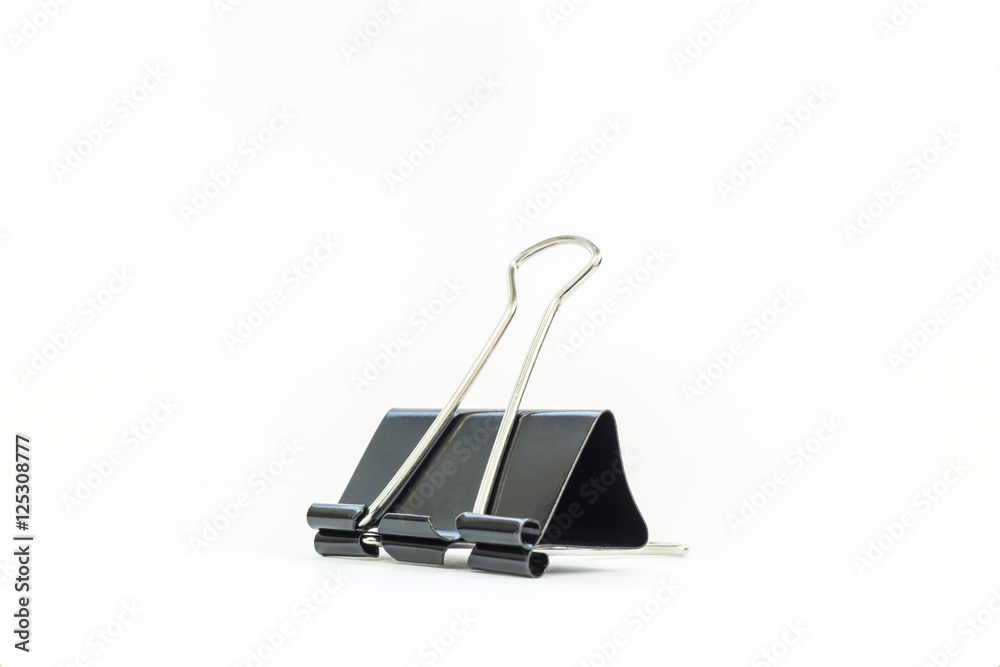 Obraz premium Black metal paperclips on white background