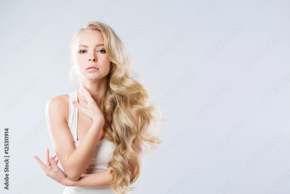 Naklejka premium Beautiful blonde. Hair style and make-up.