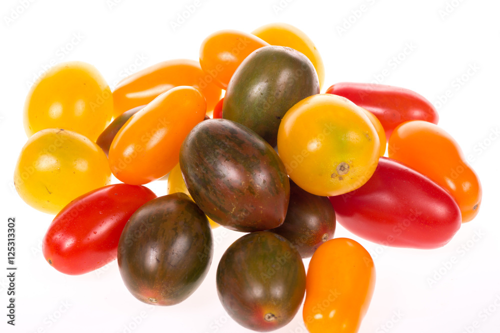 colored tomatoes on a pure white background colored tomatoes on a pure white background