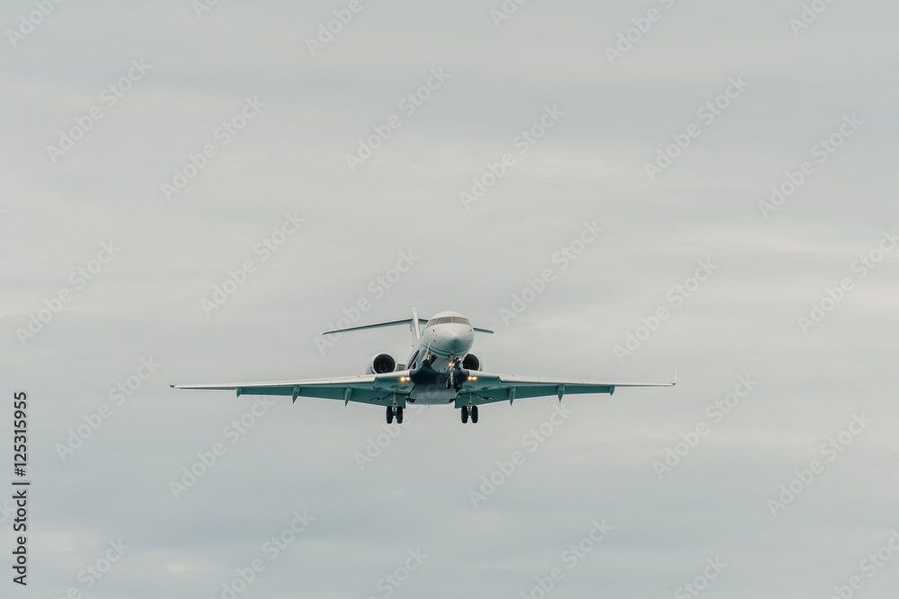 Aircraft landing in cloudy day Aircraft landing in cloudy day