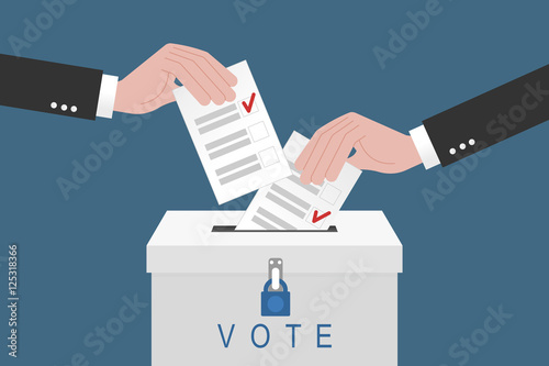 Voting concept. Hand putting paper in the ballot box