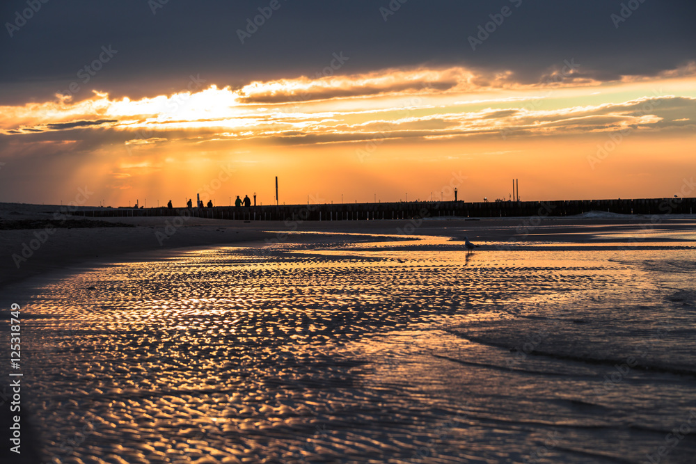 Sunset on the beach in Leba, Baltic Sea, Poland Sunset on the beach in Leba, Baltic Sea, Poland