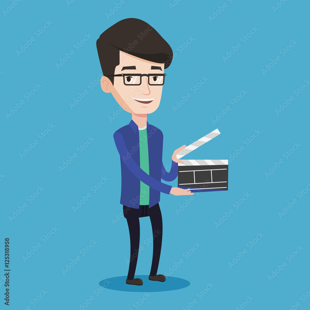 Smiling man holding an open clapperboard. Smiling man holding an open clapperboard.