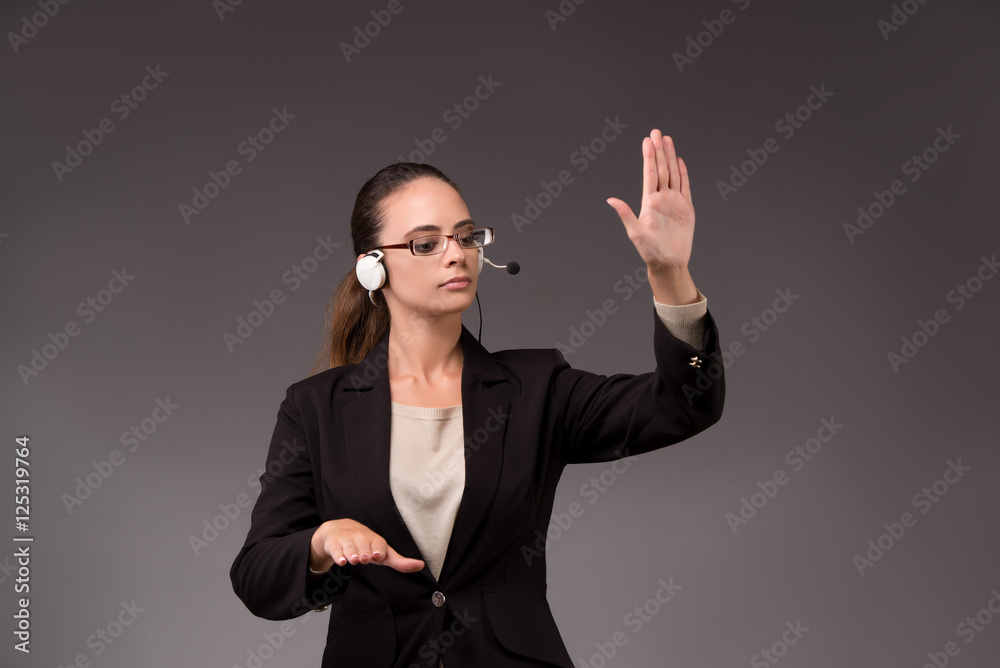 Young woman businesswoman pressing virtual buttons Young woman businesswoman pressing virtual buttons