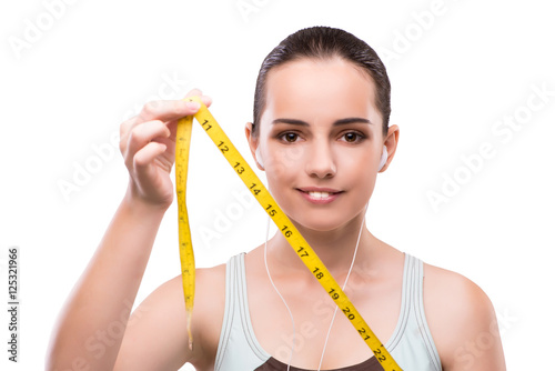 Young woman with centimeter in diet concept