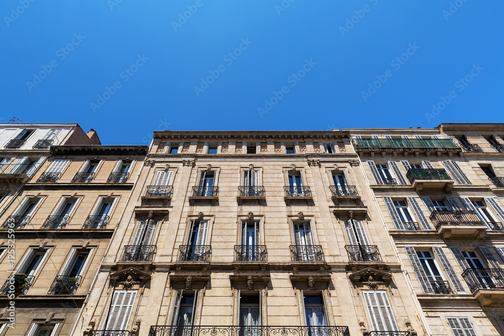 Fototapeta premium Typical French buildings in Marseille, France on a spring day. 