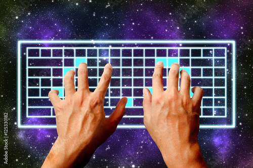 Hands typing on virtual keyboard universe and stars background. photo