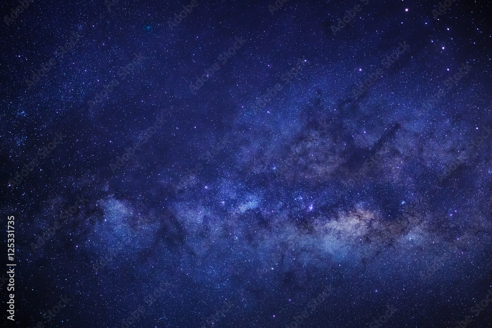 Naklejka premium Milky Way galaxy, Long exposure photograph, with grain.