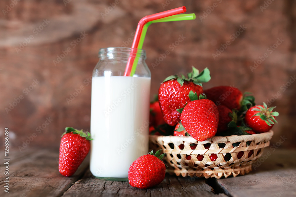 strawberries and milk in a glass strawberries and milk in a glass