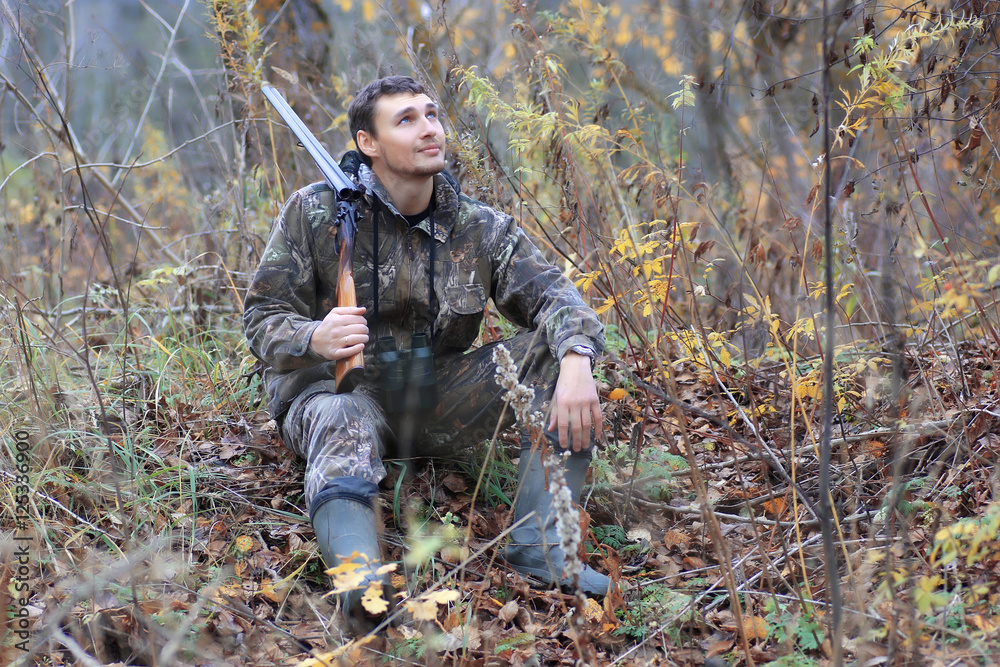 man hunter outdoor in autumn hunting