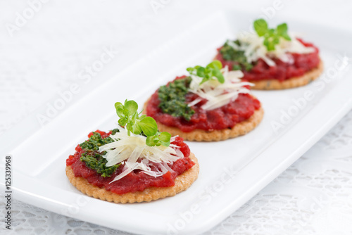 crackers with beetroot pate and pesto