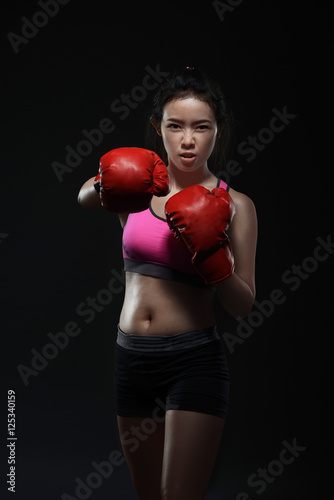 Beautiful asian woman with the red boxing gloves © Leo Lintang