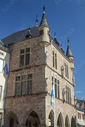Town hall of Echternach with the flag of Luxemburg photo
