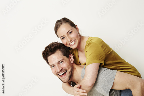 Young at heart couple smiling at camera