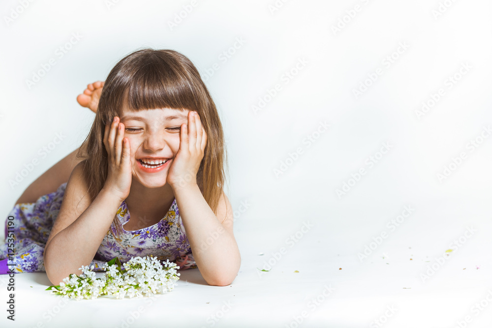 Portrait of the happy girl with the white lilac Portrait of the happy girl with the white lilac