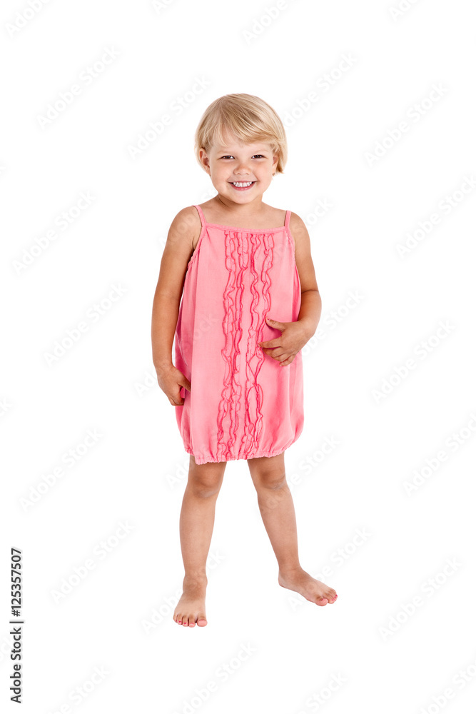 Pretty girl posing for the camera, in a pink short dress Pretty girl posing for the camera, in a pink short dress