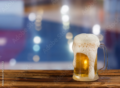 cold light beer mug in a pub