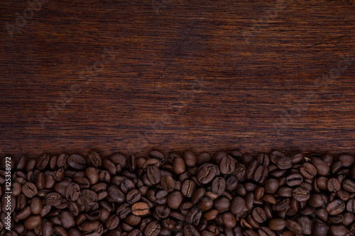 coffee beans on wooden desk