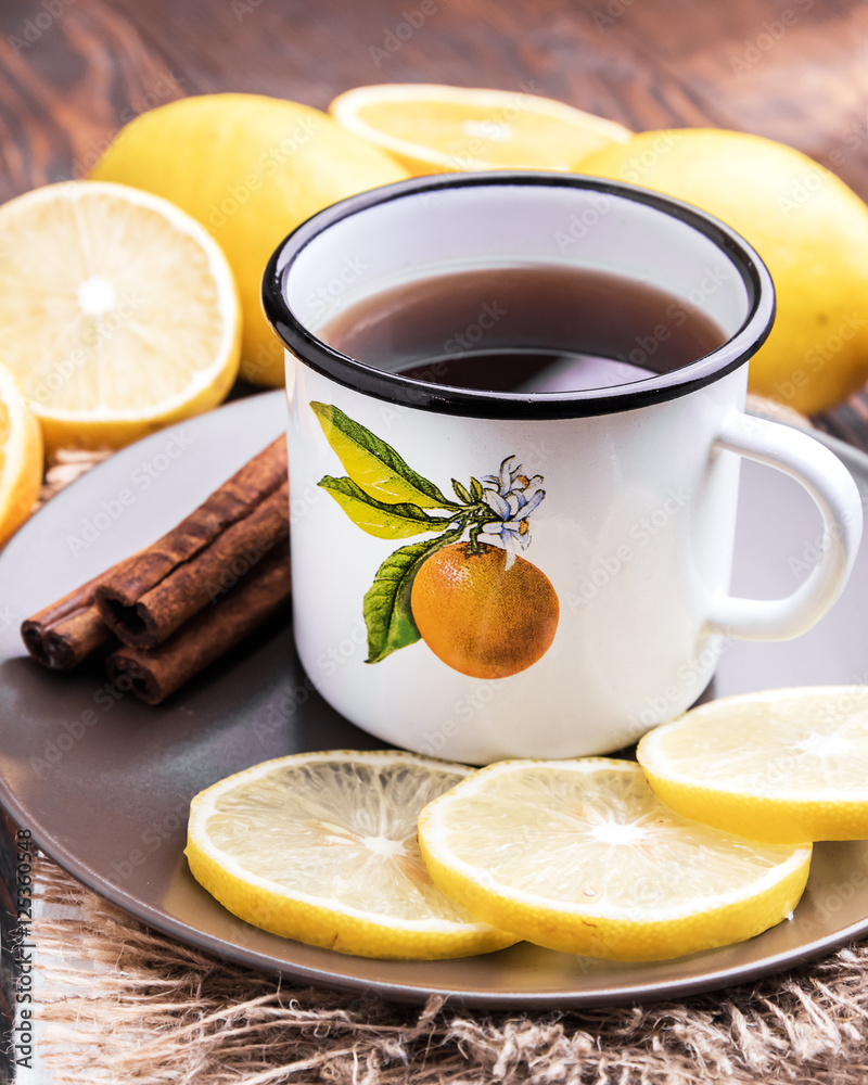 Hot black tea Lemon slices on plate Rustic Hot black tea Lemon slices on plate Rustic