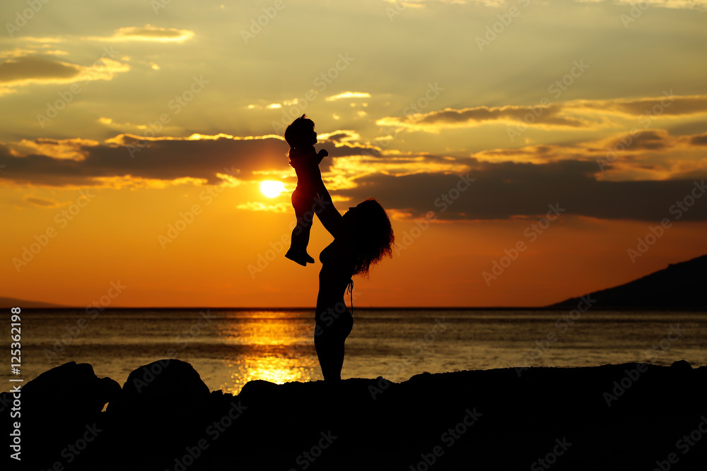 Mother and son on beach