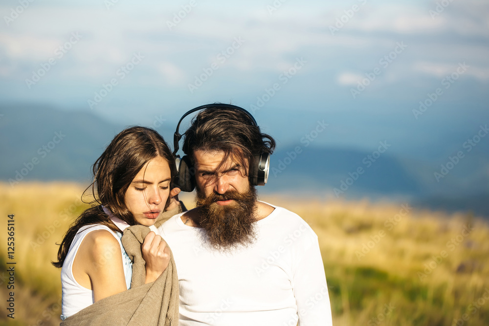 Young couple with headphones